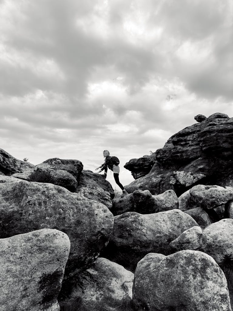 Hiker Climbing Rocks